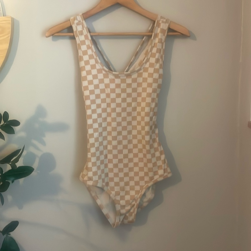 Shop ARQ body suit